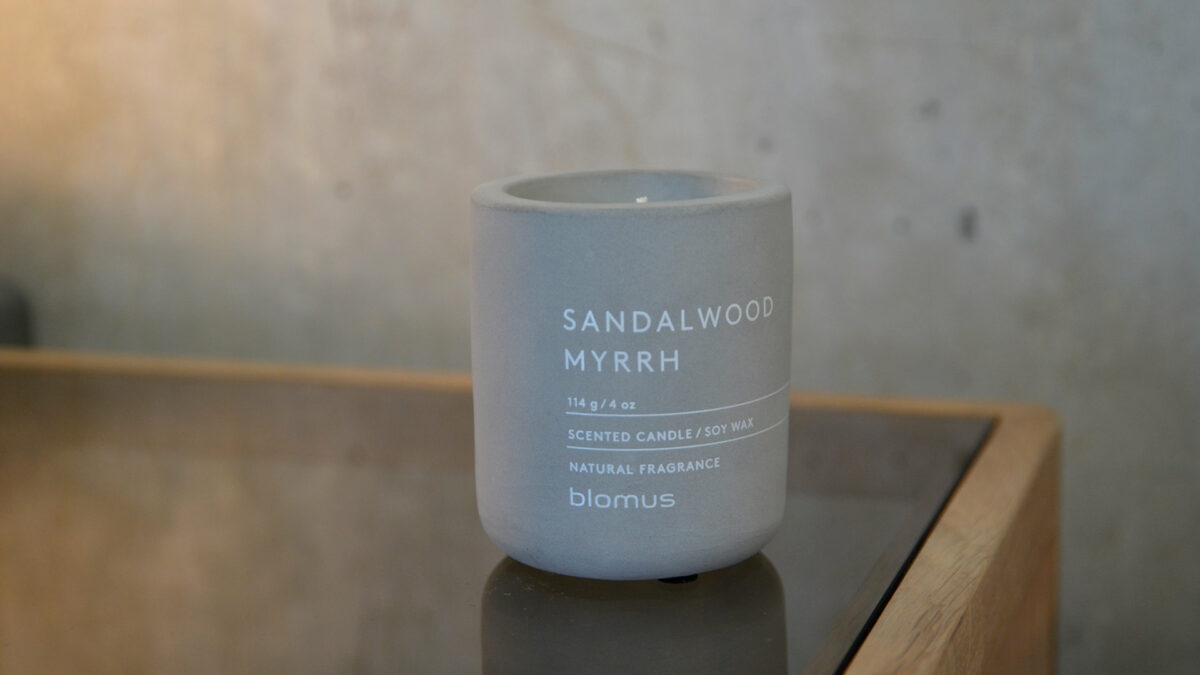 sandalwood scented candle in grey concrete look jar