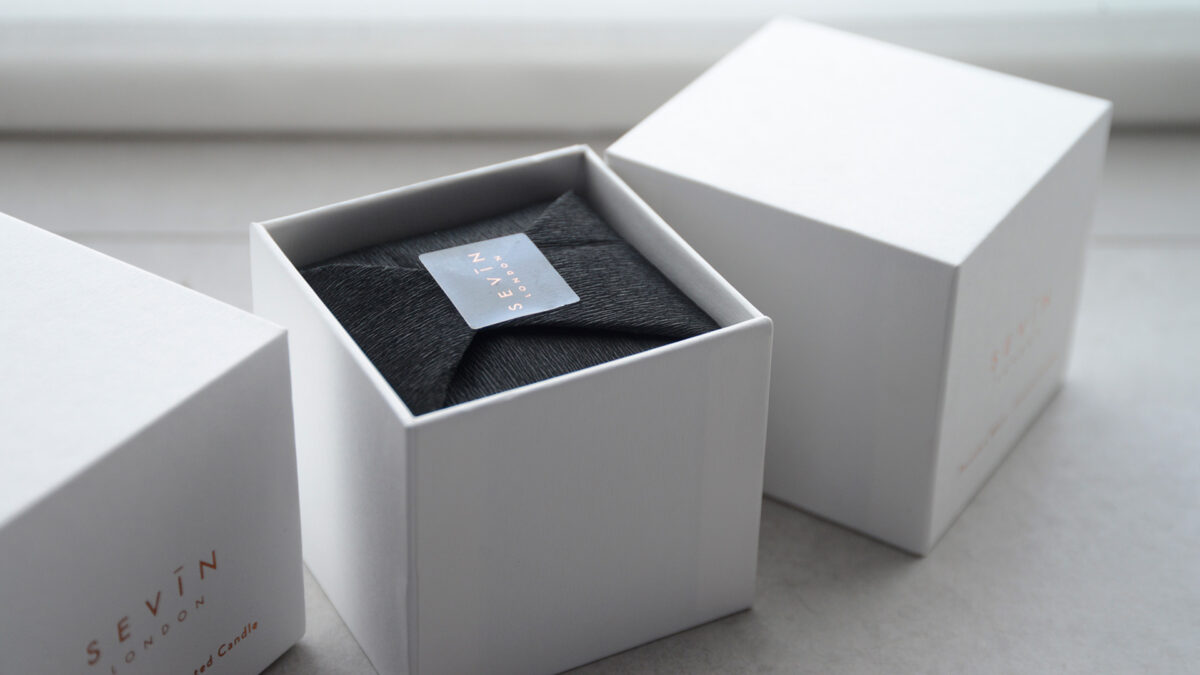 hand made, natural and vegan scented candles by Sevin shown in their gift boxes