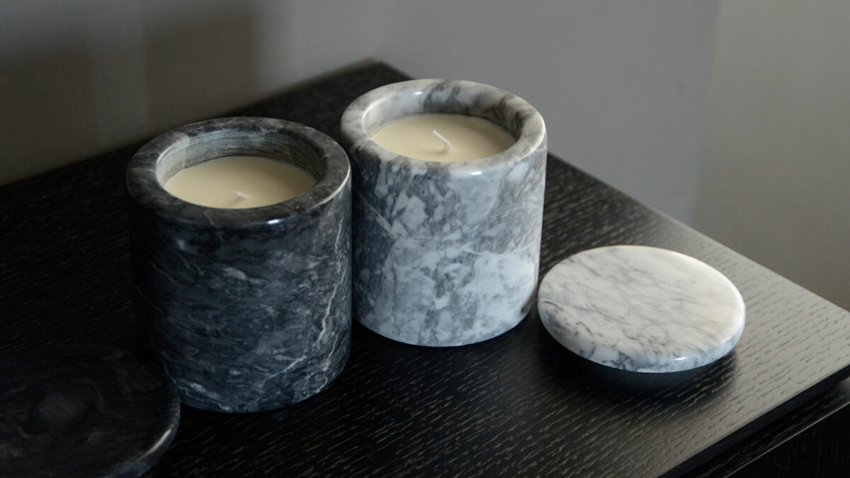 luxury scented candles in grey marble pots