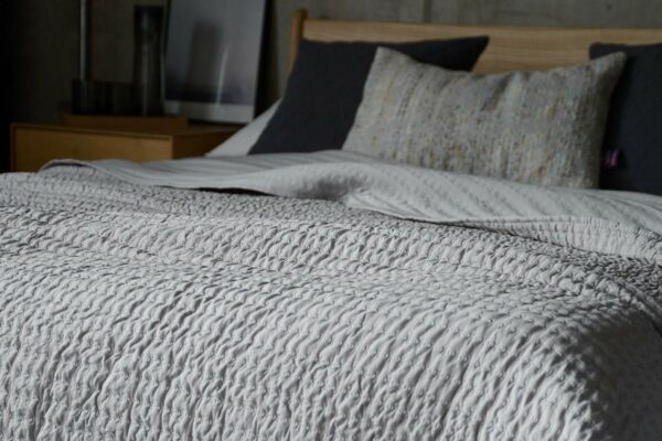 light grey quilt