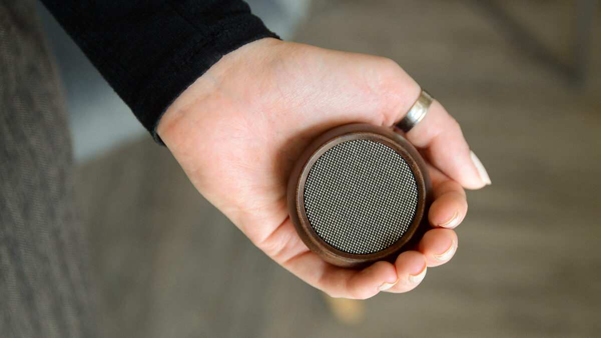 selfie speaker in hand close up