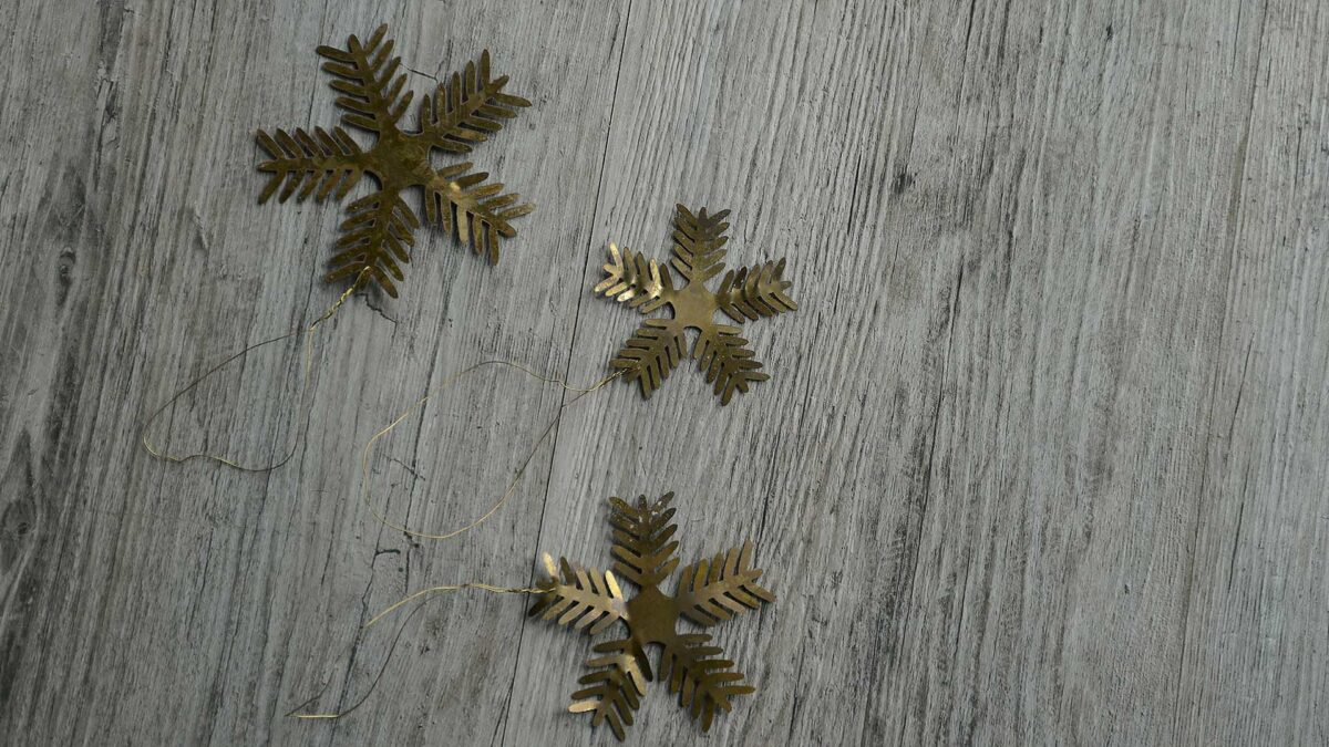 set of brass colour snowflakes