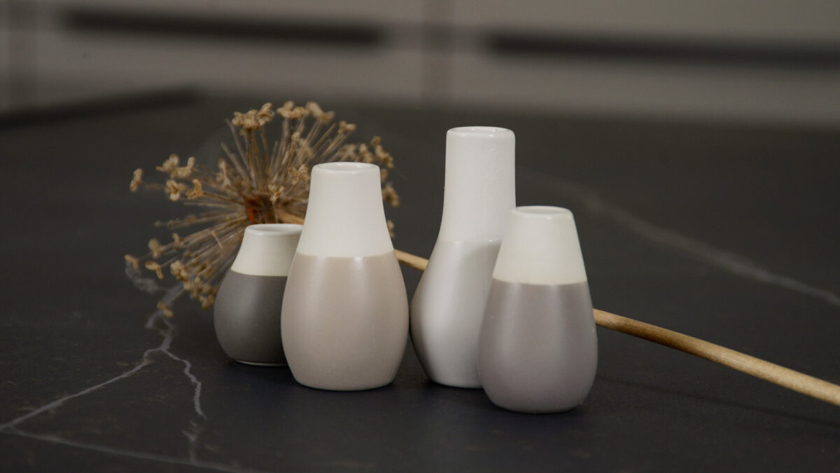 set of 4 mini vases with grey to beige neutral accent colours