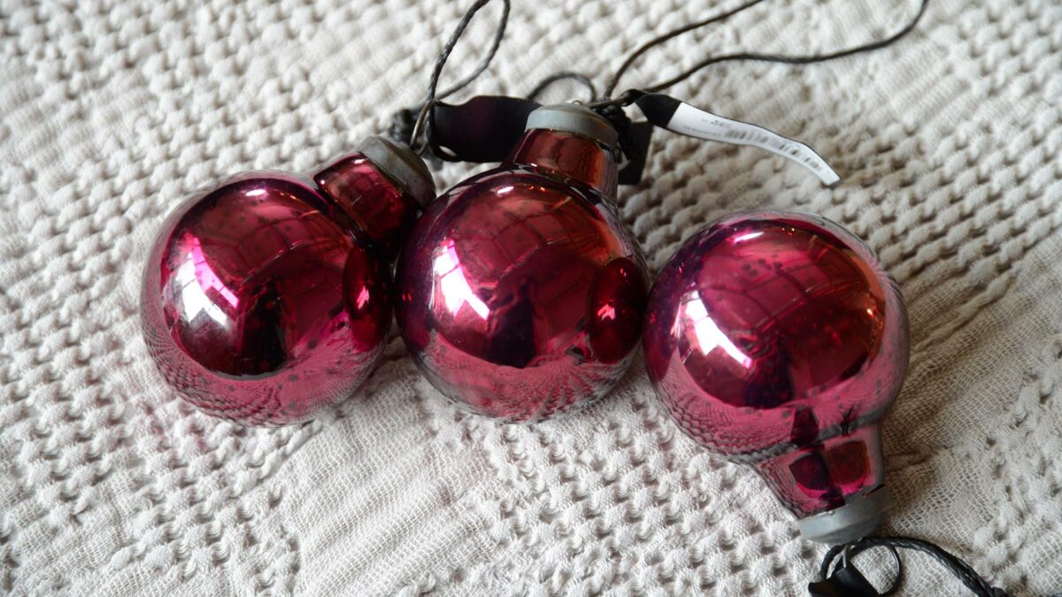 set of vintage look baubles in deep pink