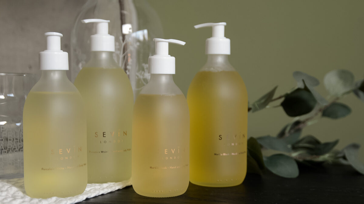 sevin mini and large body wash bottles
