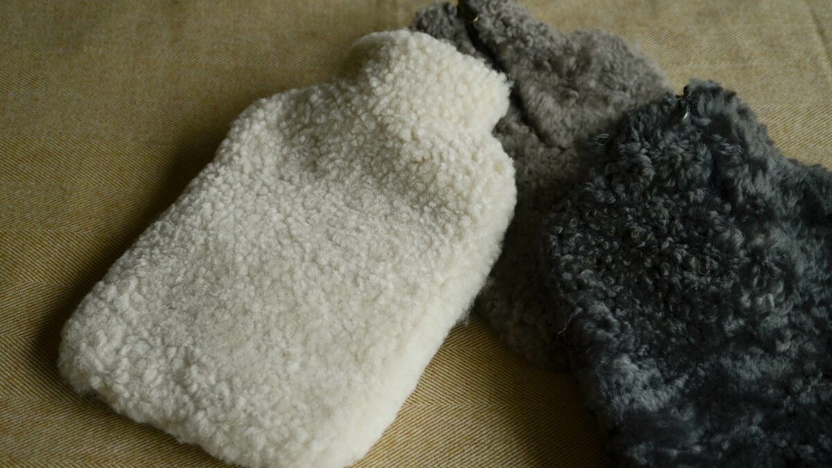 soft sheepskin covered hotwater bottles in 3 colours