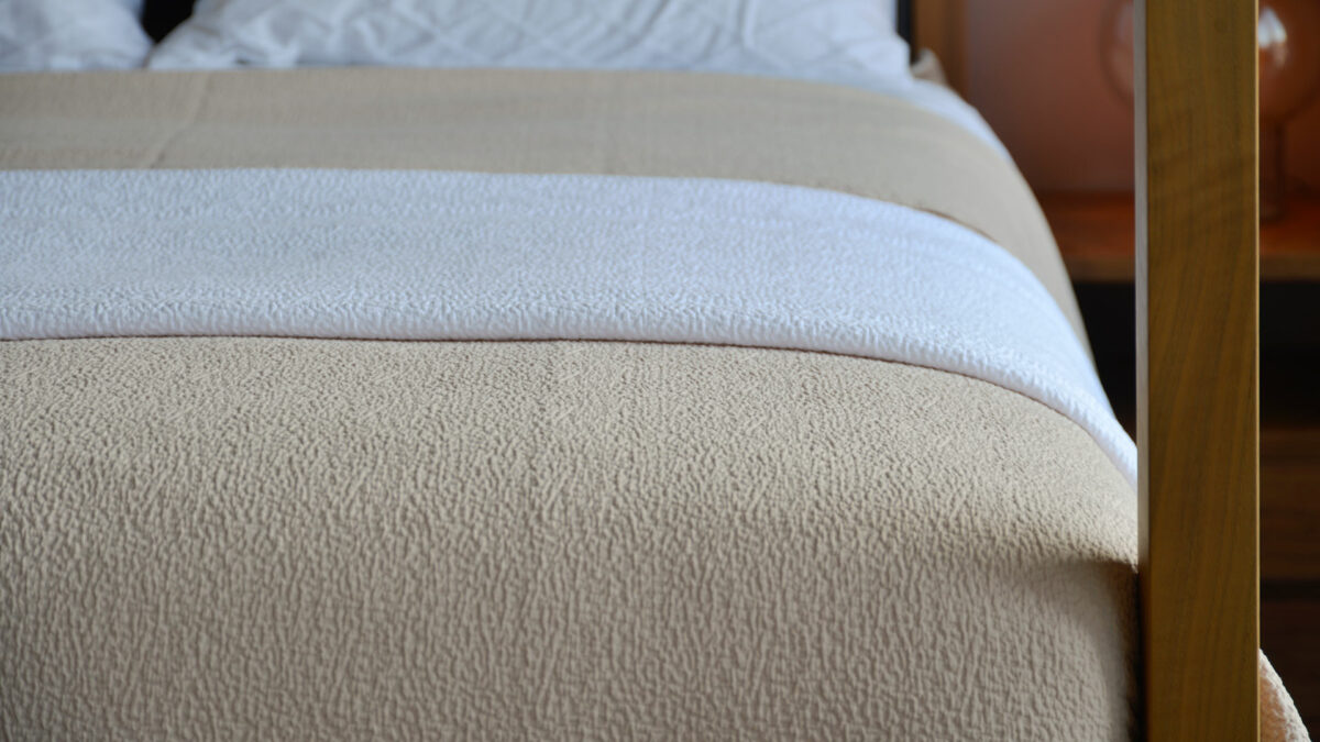 Bedspreads With Dappled Texture - Lightweight textured bedspreads in white or shell peach