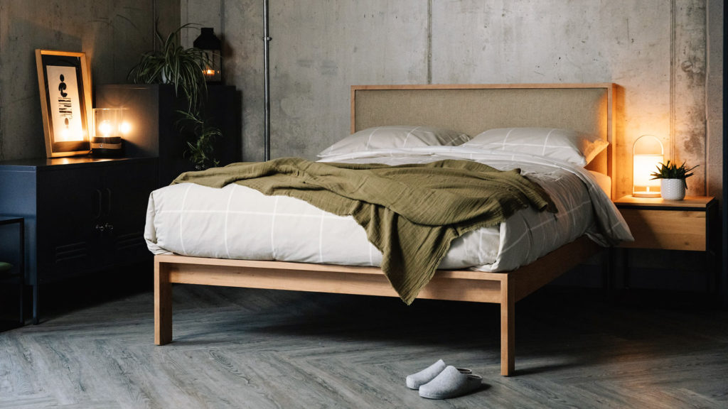 Shetland hand made wooden bed in cherry, with headboard upholstered in Parquet Hessian