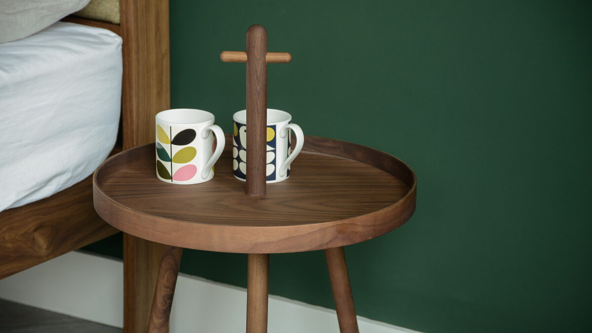 walnut wood tray table with handle a close-up view