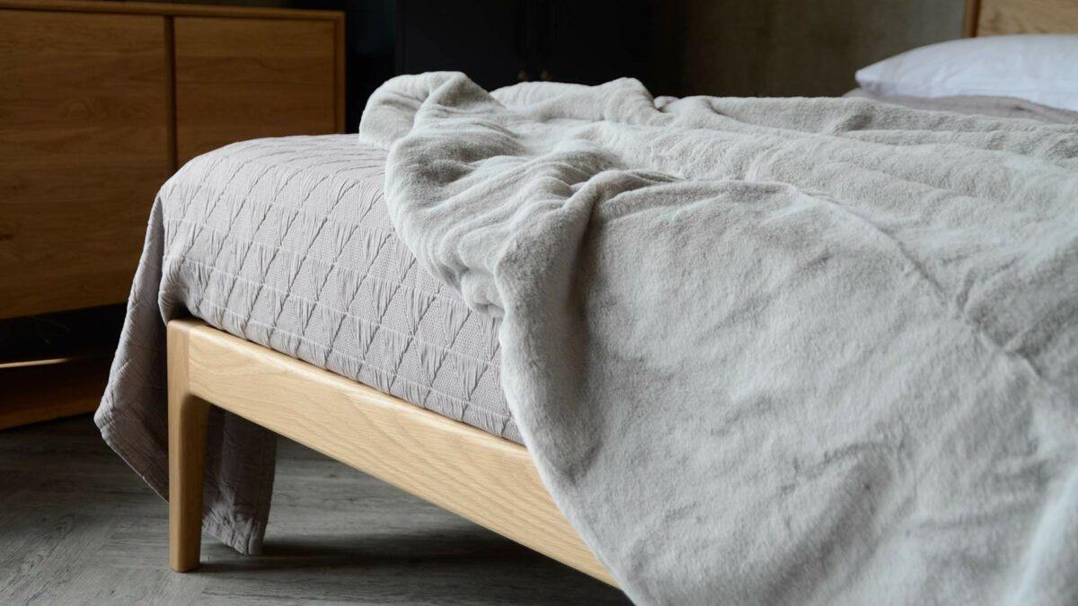 Silver grey faux fur bedspread