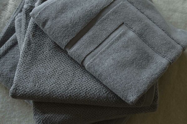 grey-textured-towels with bath mat