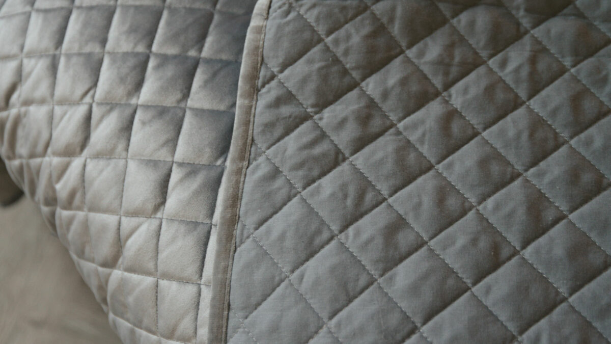 Silver grey velvet look quilted and reversible bedspread a closer view