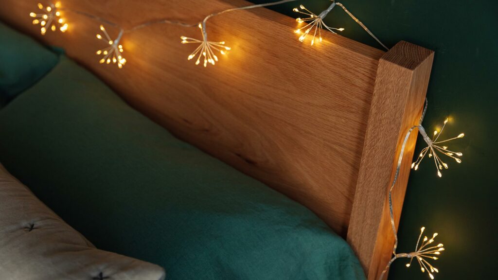 silver starburst light string on zanskar bed