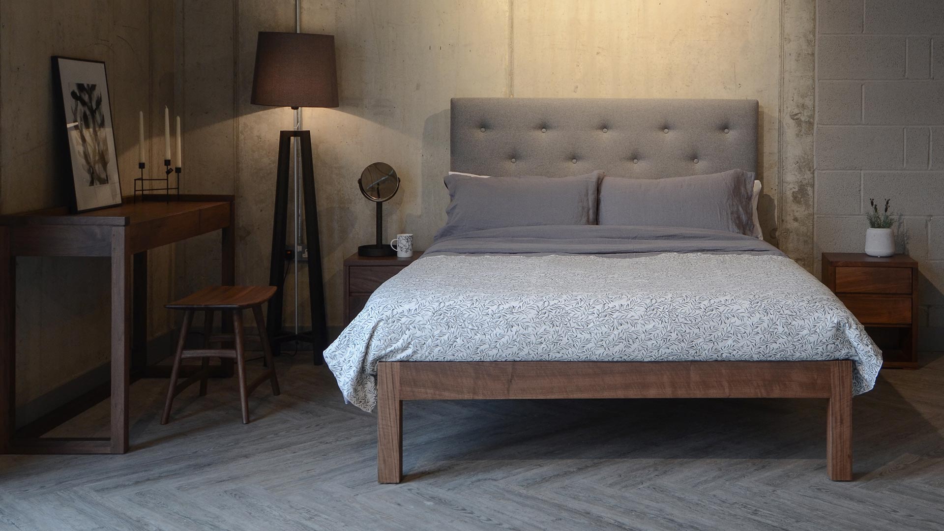 Loft style bedroom with walnut wood Skye tall buttoned headboard bed and walnut bedroom furniture