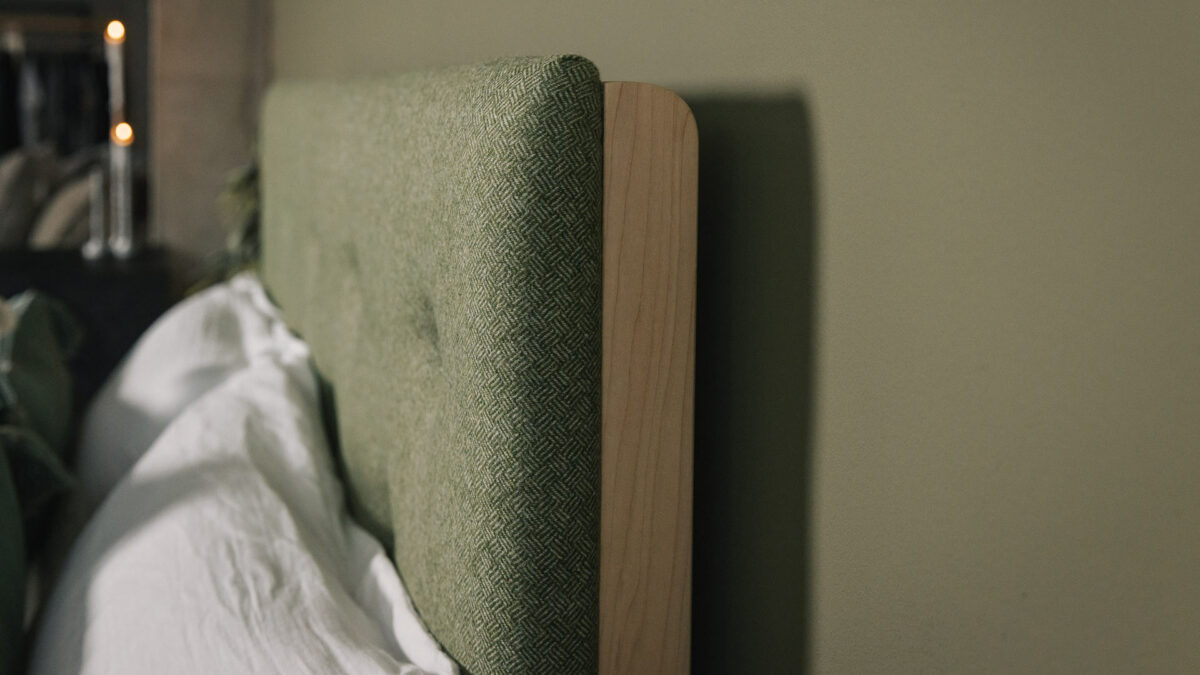 a closer view of the Skye bed upholstered headboard from the side