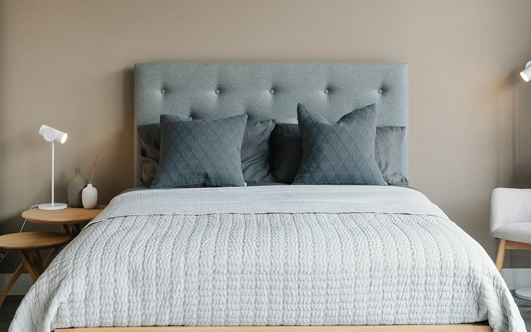 Chunky solid oak Skye bed with a wool upholstered tall headboard in grey