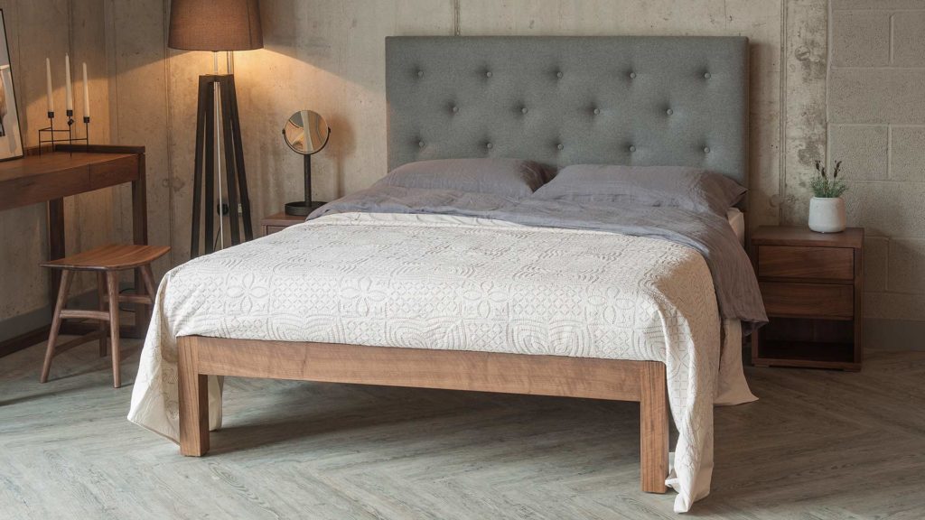 skye upholstered bed with tall buttoned headboard