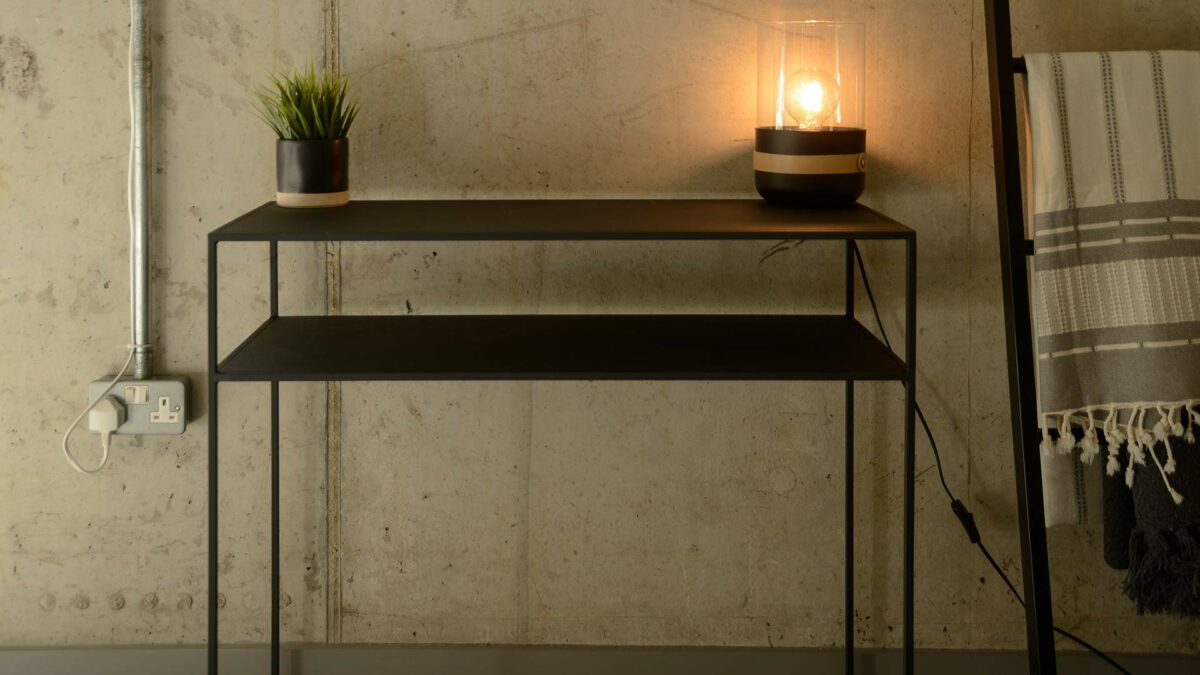 metal console table with shelf in dark slate grey