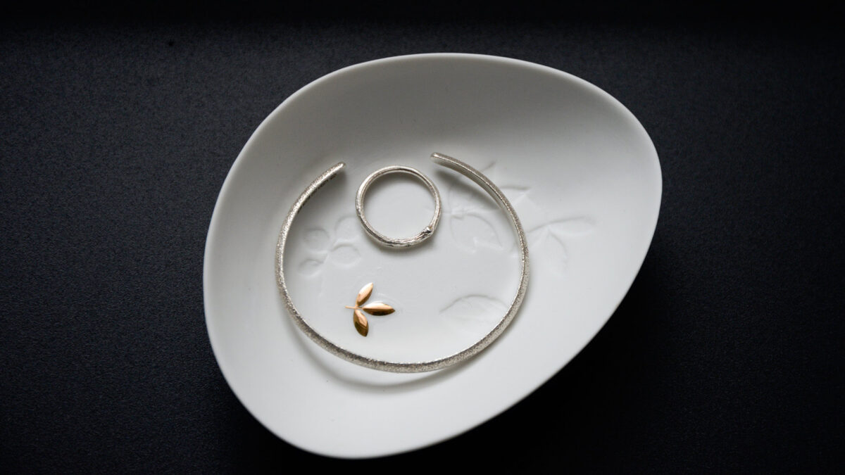 small leaf motif dish with jewellery