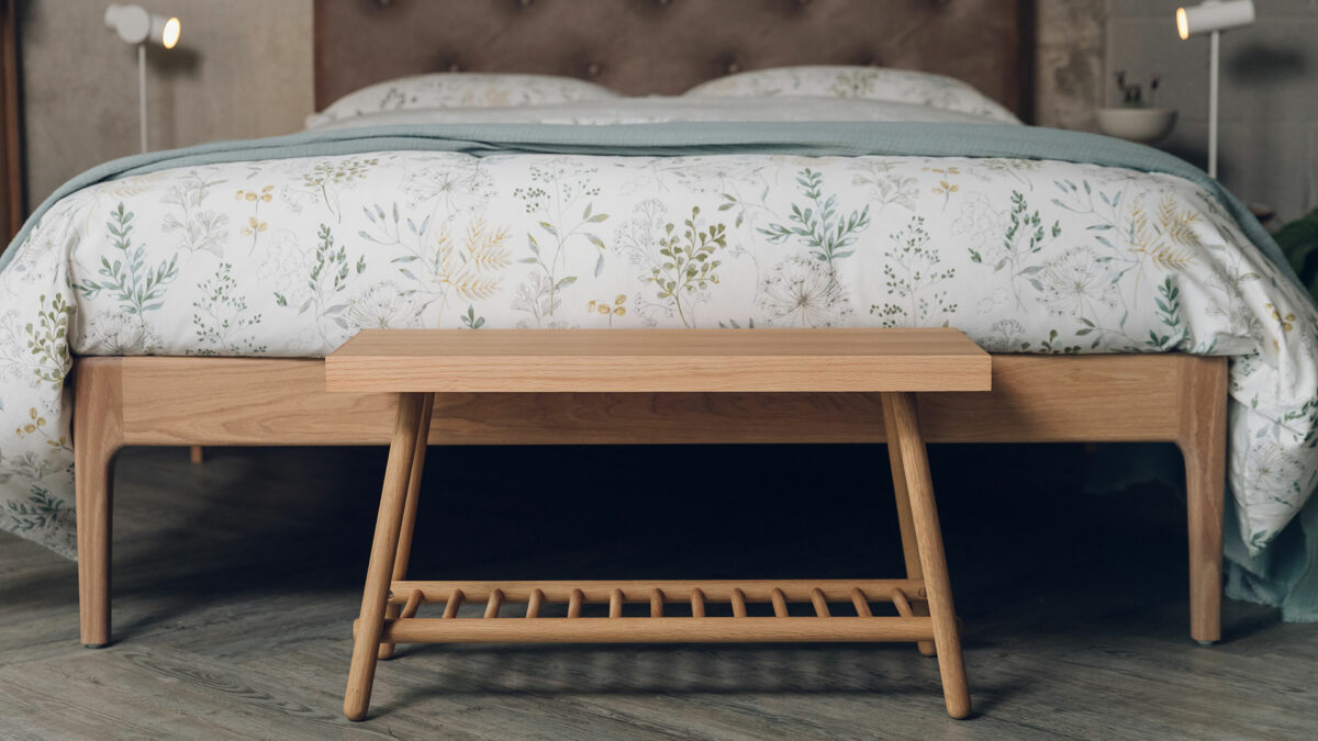 small oak bench with spindle lower storage shelf