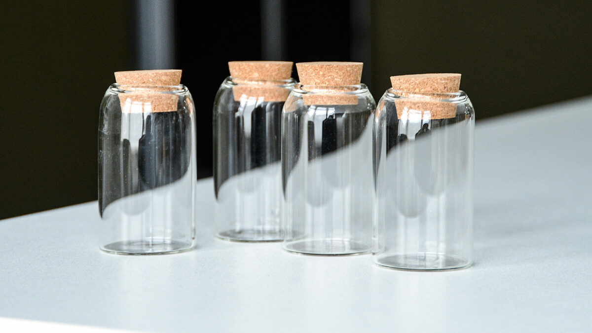 small slim glass storage jars