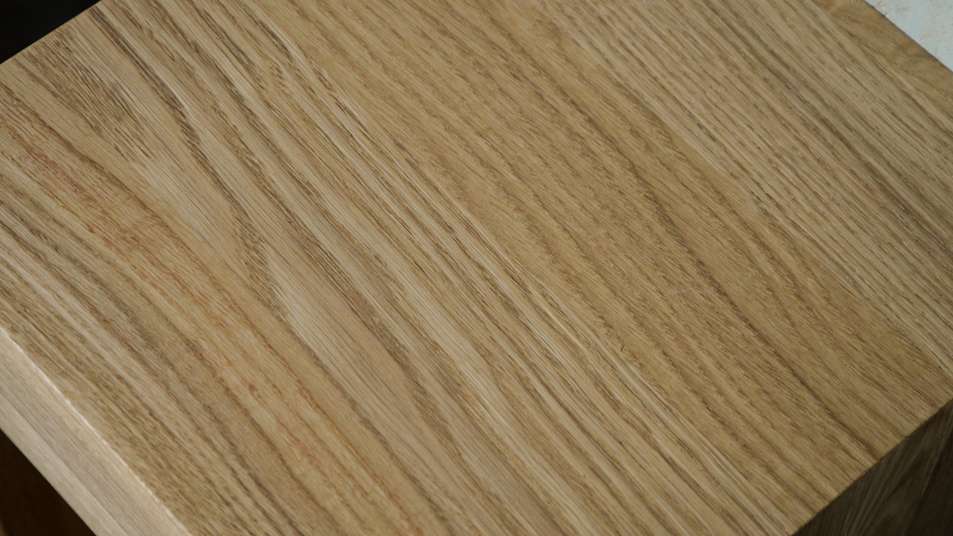 close up of oak finish for wall hung bedside table