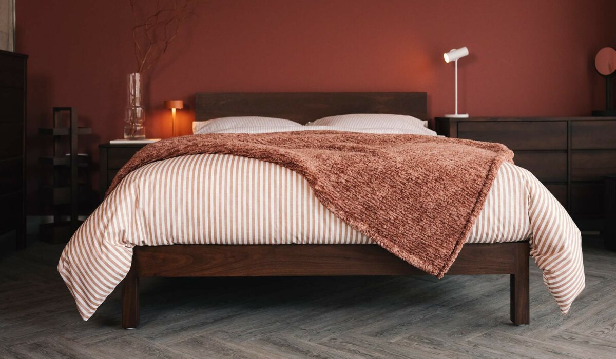 smoked walnut Malabar bed with rusty red fleece