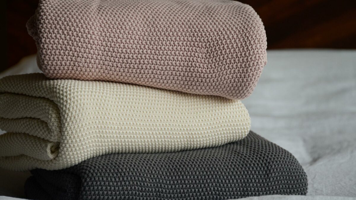 moss stitch knitted cotton throw in 3 colour options