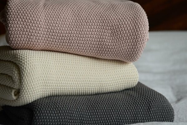 moss stitch knitted cotton throw in 3 colour options