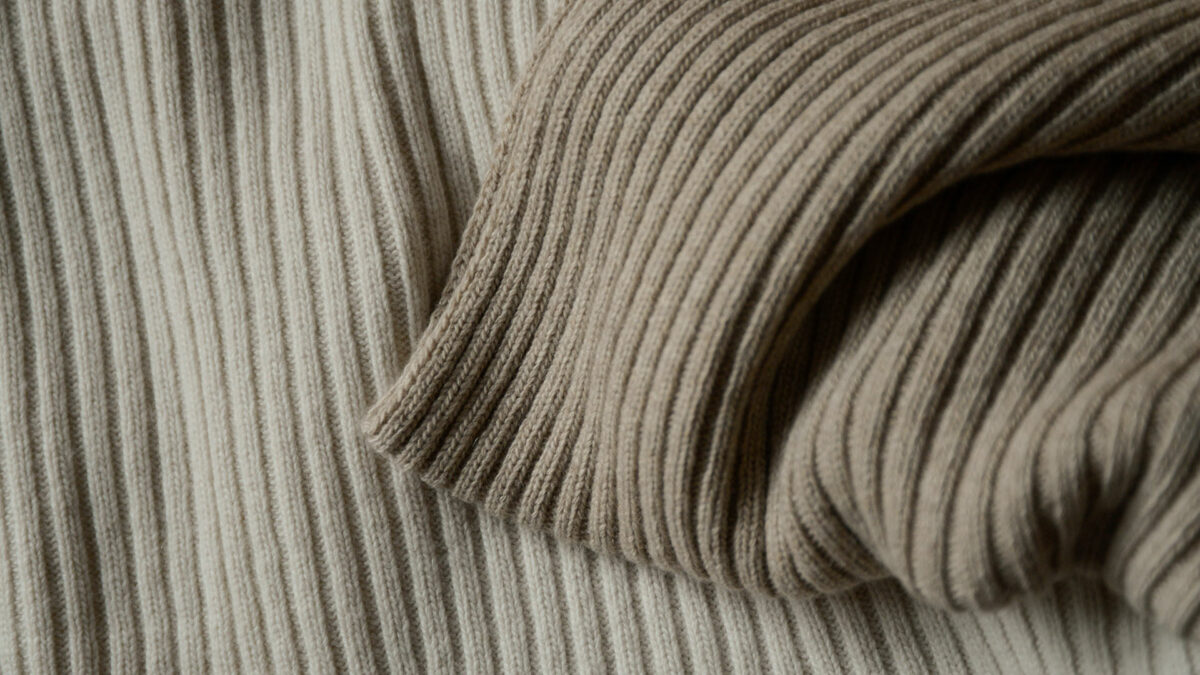 soft knitted ribbed bed runners in cream and beige