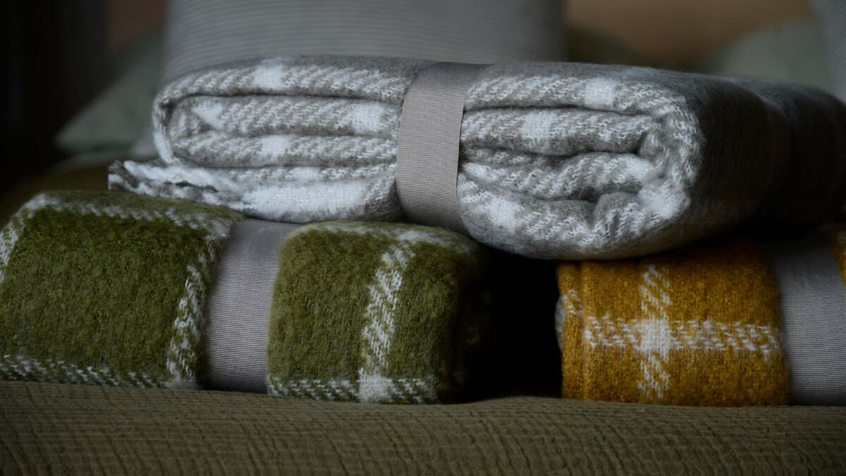 soft knit throws with large check pattern