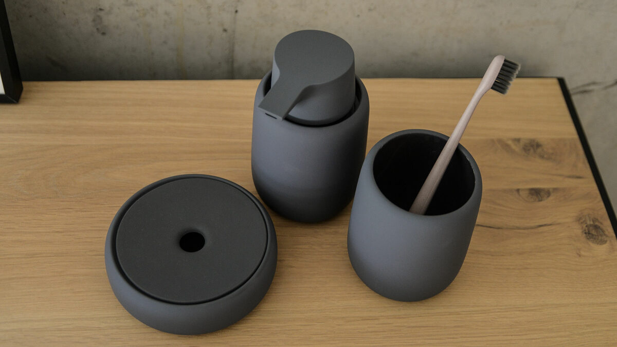 soft touch bathroom accessories in slate grey colour including soap dispenser and storage jar