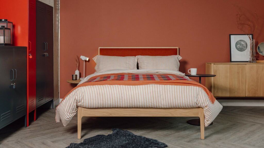 solid oak Carlisle bed with red headboard scaled