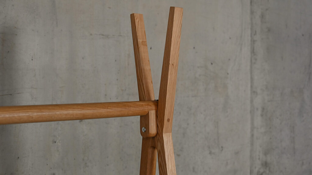 Closeup image showing the cross beam detail on the Freestanding Solid Oak Clothes Rail.