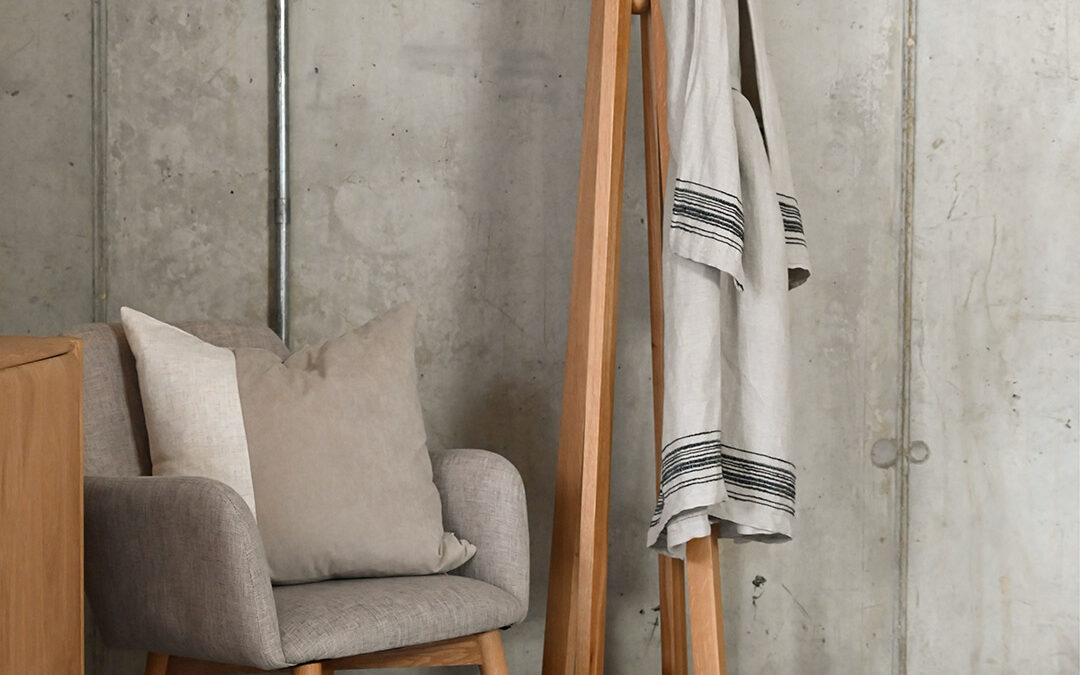 Image showing the Spire Coat Rack in use in a modern room setting.
