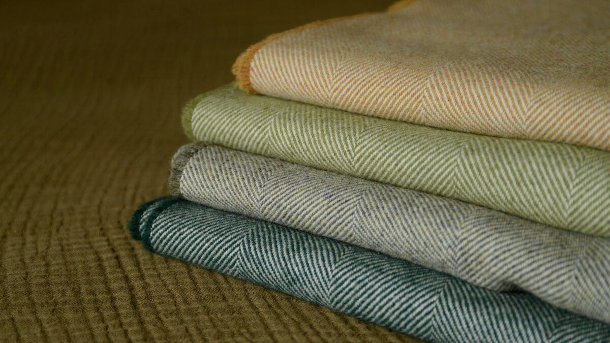 stack of herringbone throws 1