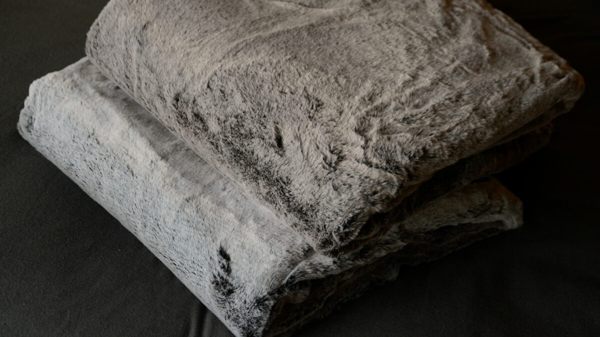 large soft faux fur throws in silver and taupe colour options