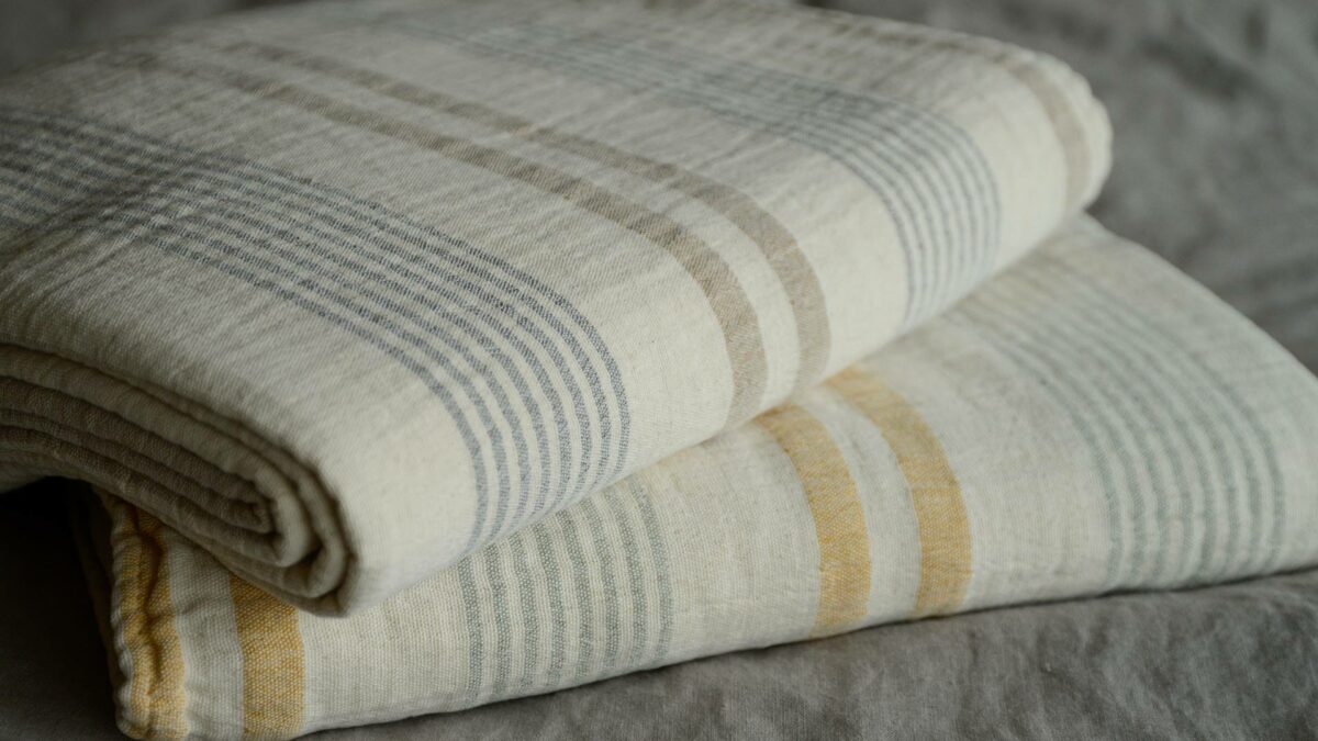 stack of striped cotton throws