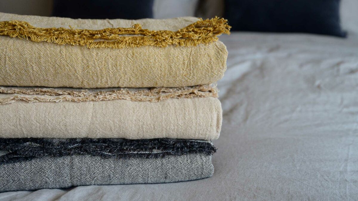 stack of waltons linen and cotton throw