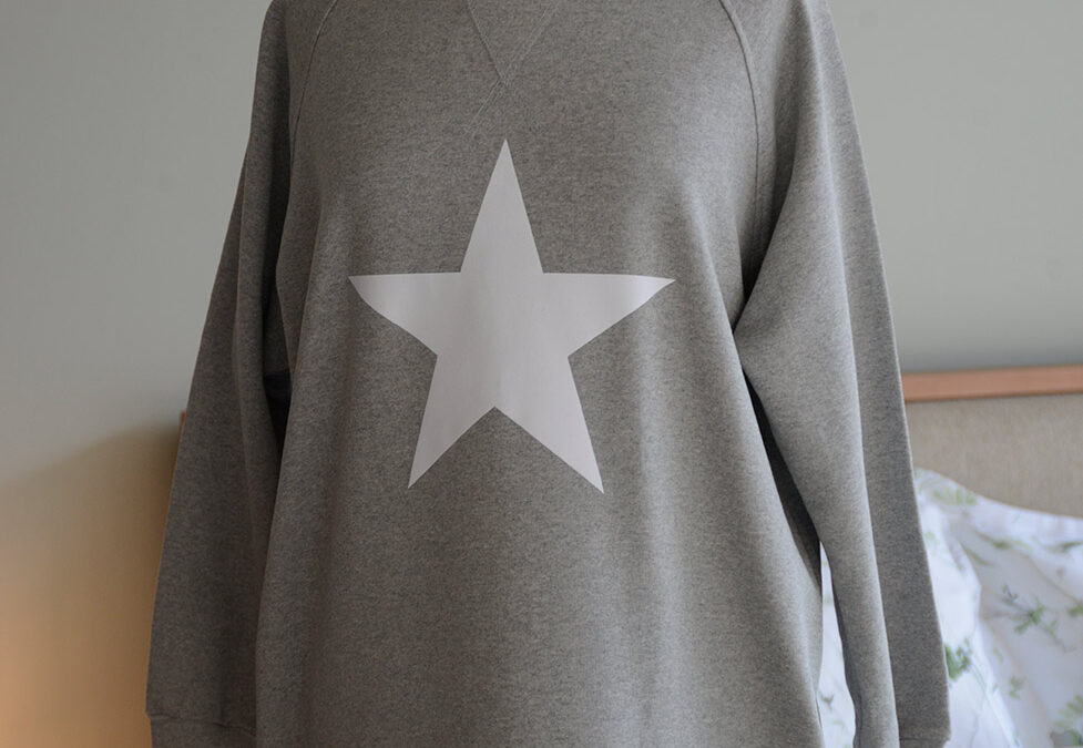 grey marl loose fitting sweatshirt dress with star print