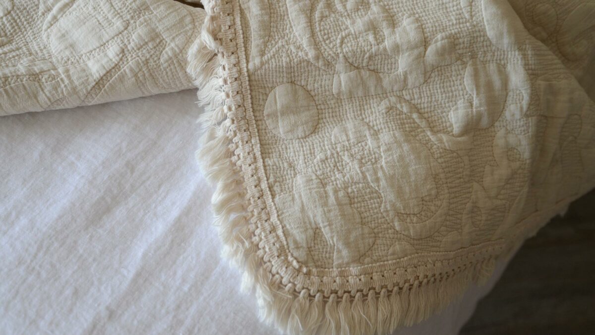 stone colour embroidered throw