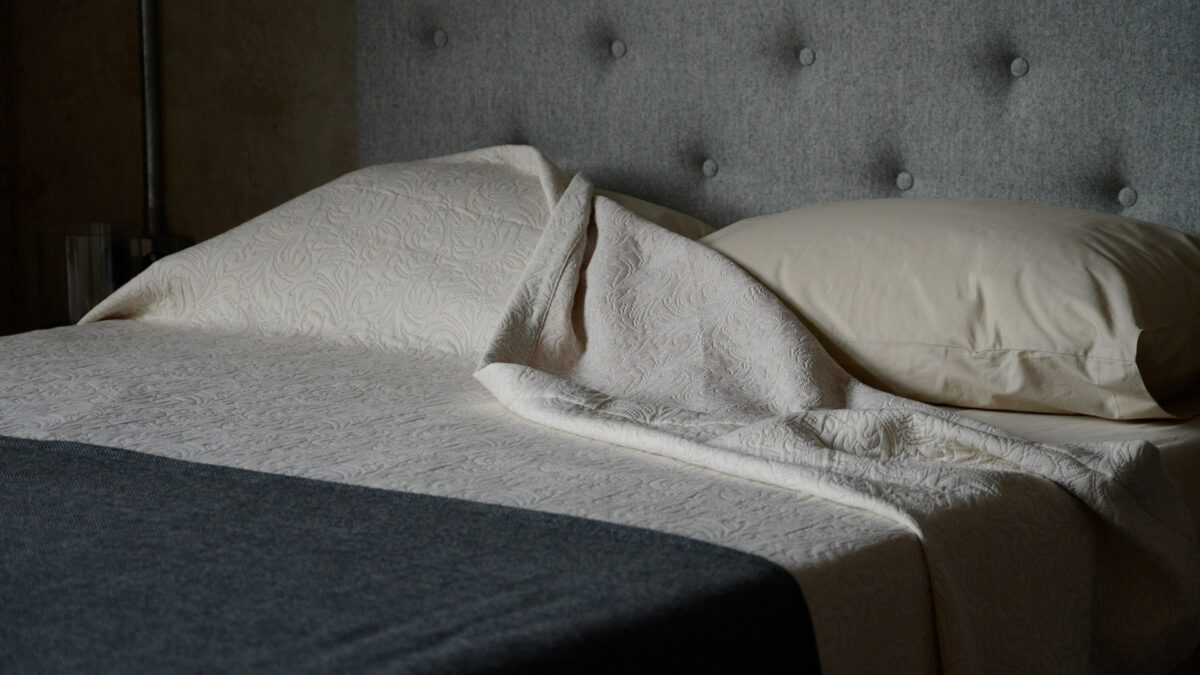 stone colour patterned bedspread