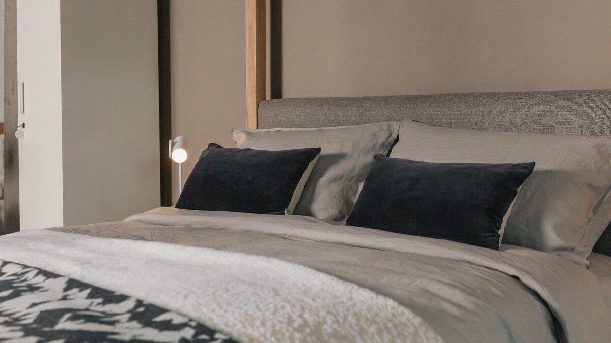 stone coloured linen bedding shown on our Highland 4 poster bed