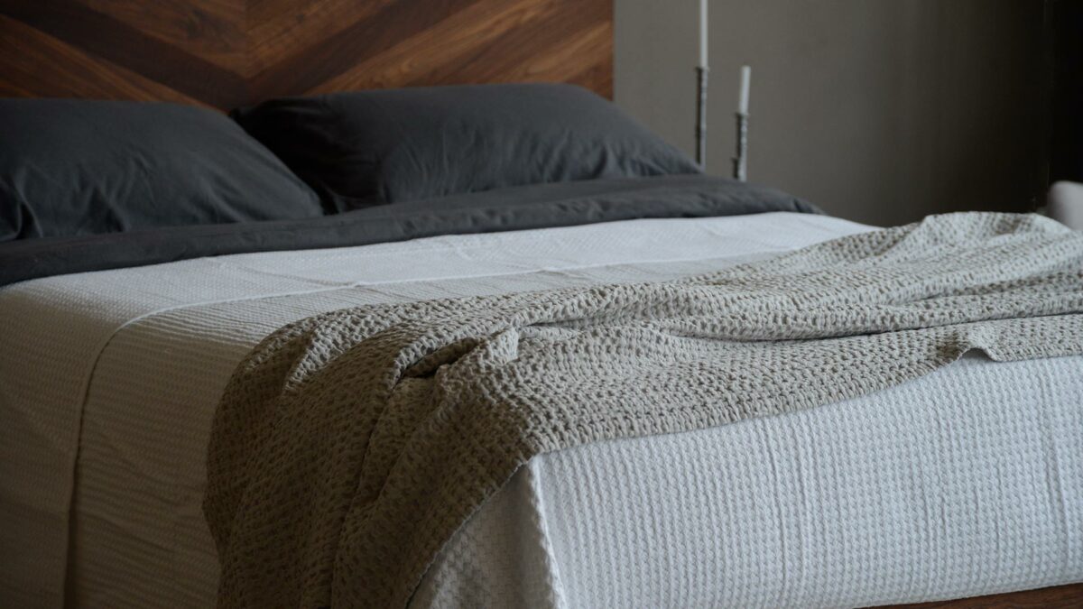 Waffle weave throw in a stone colour