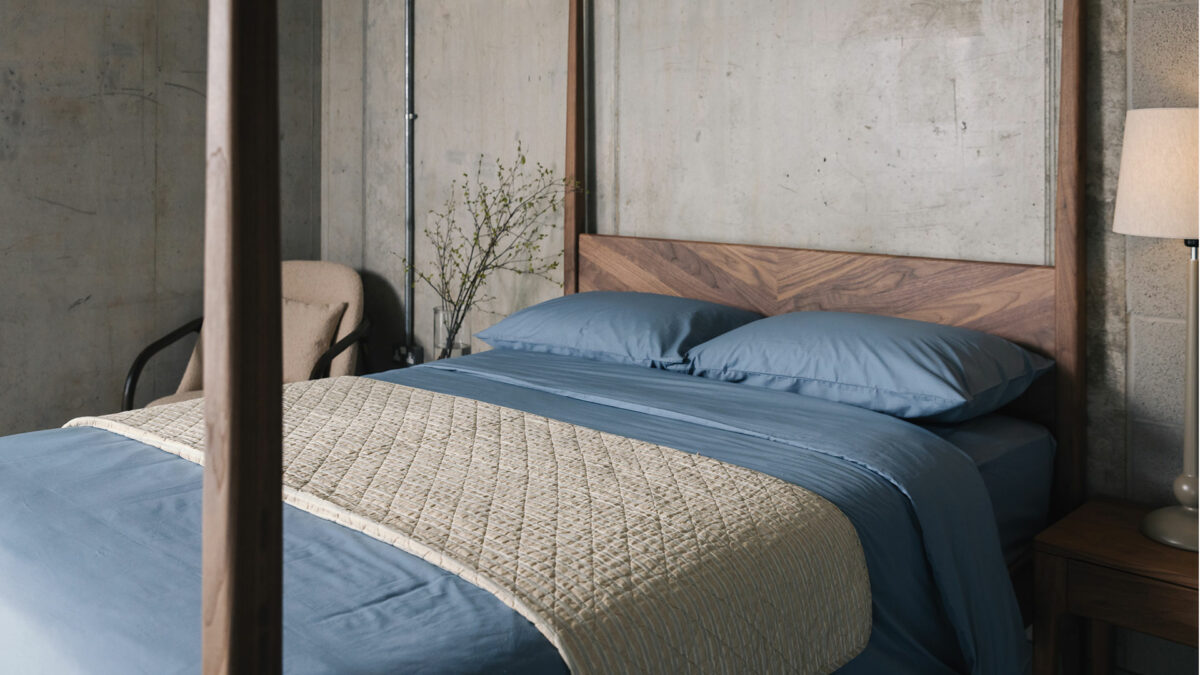 storm blue cotton bedding on walnut 4 poster Harrow