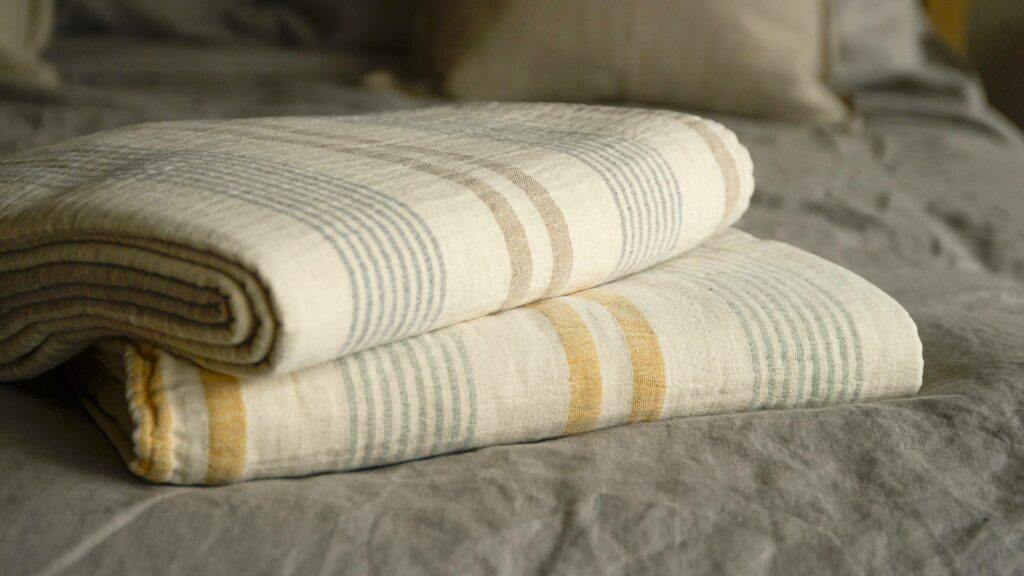 striped organic cotton throws in two colour options