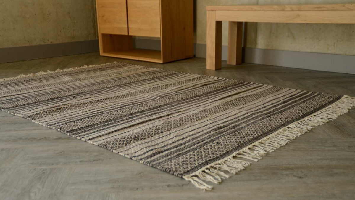 striped rug in charcoal and ecru