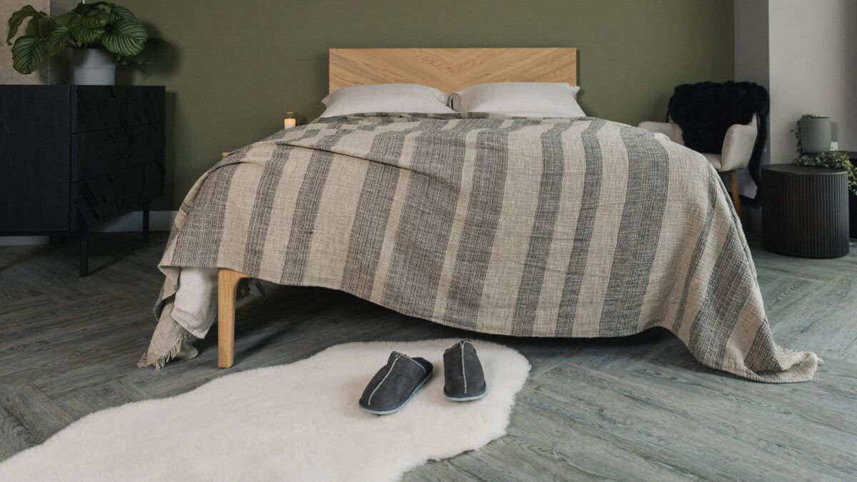 luxurious textured weave bedspread with stripes of taupe and black threads