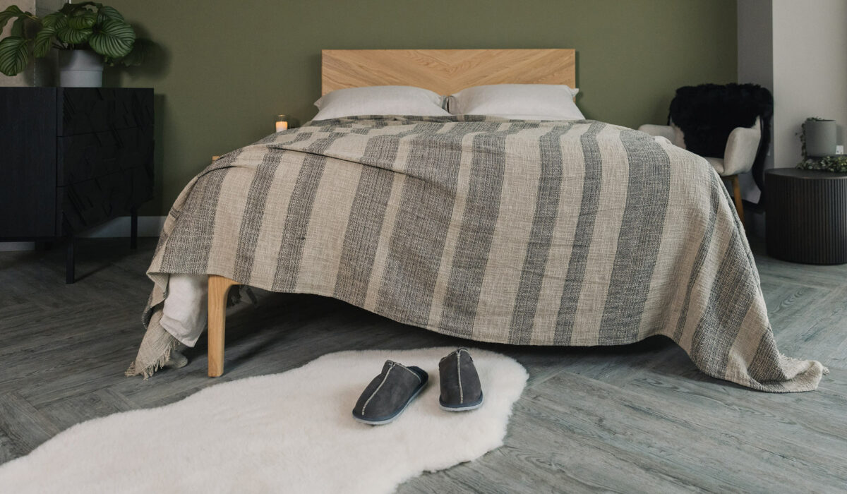 luxurious textured weave bedspread with stripes of taupe and black threads