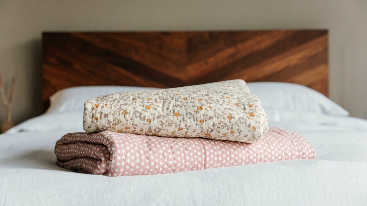 summery floral and dotty quilted throws stack